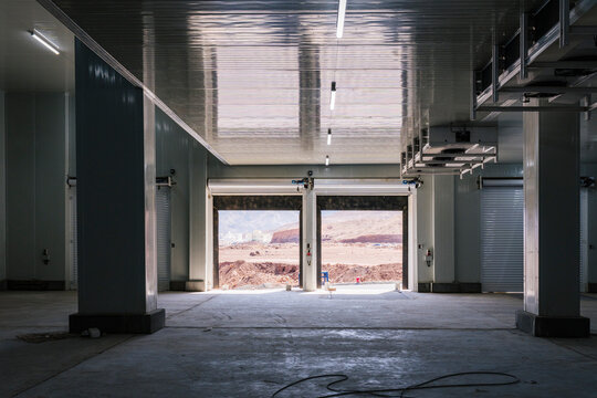 Interior of spacious illuminated industrial building