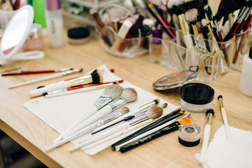 makeup brushes in the process of applying makeup