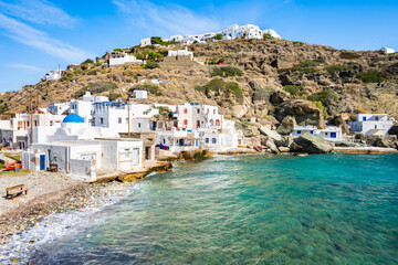 Beautiful beach with azure sea and church on shore in Kastro village, Sifnos island, Greece