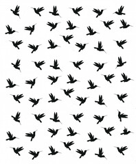 Silhouetted Hummingbirds Wallpaper - Background of repetitive birds in different flight patterns

