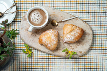 Two shortcrust pastries with coffee