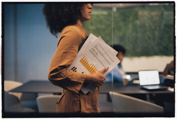 Businesswoman coming to conference room 