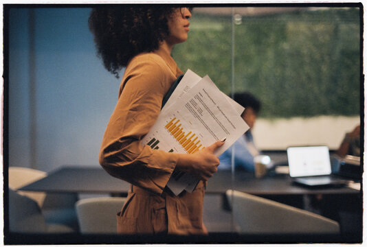 Businesswoman coming to conference room 