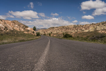 street and rock formation in cappadocia