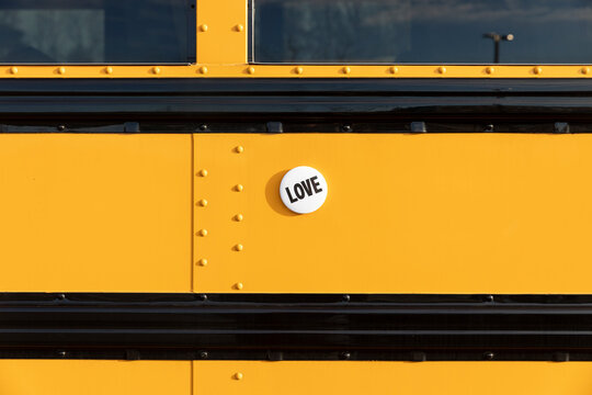 Button Vertical with the word LOVE Yellow School bus 