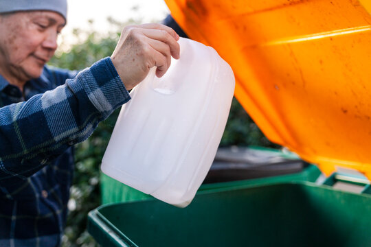 Taking out recycling at home