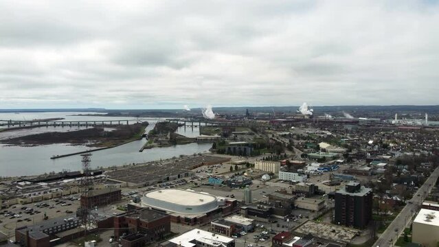 Sault Ste. Marie Canada drone shot flying towards manufacturing facility