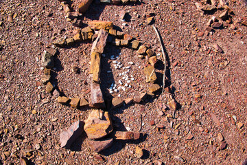 Mysterious symbol made of stones, in the dry hills near Vale Fuzeiros, Algarve, Portugal.
