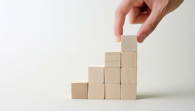 business development and growth success process concept, close up hand arranging wood block