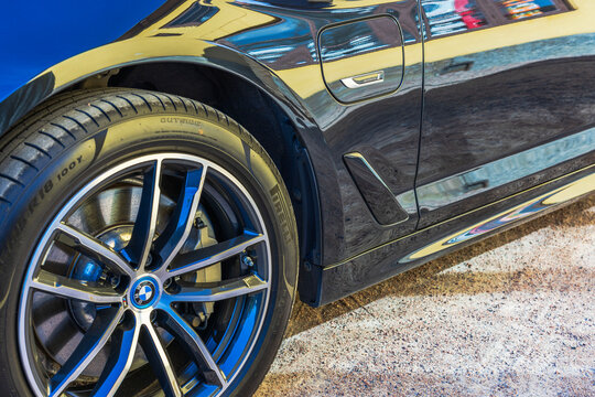 Close-up view of the Pirelli front wheel and design of the BMW i4 2023 electric car. Sweden. 