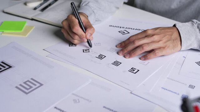 Young Asian Graphic designer working in office. Designing logo Artist Creative Designer Illustrator Graphic Skill Concept.