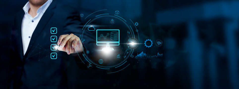 Big Data: Businessman checks Big Data technology and checklist approves, Management of Business on virtual interface, Data Analysis concept.