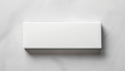 Minimalist white rectangular object on grey
