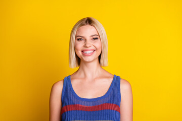Photo of sweet blond hair girlfriend toothy beaming smile advertising stomatology clinic whitening procedure isolated on yellow color background