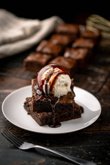 vanilla ice cream on chocolate brownie