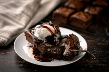 vanilla ice cream on chocolate brownie