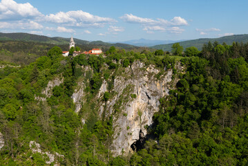 Catholic church high on rocky cliffs near Skocjan Caves, Slovenia