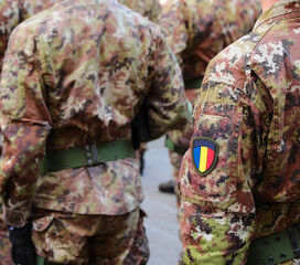 soldiers in military uniform with the national flag in three colors blue yellow and red d