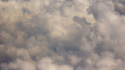 Puffy beautiful clouds, white cloudscape pareidolia