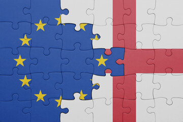 puzzle with the colourful national flag of england and flag of european union.