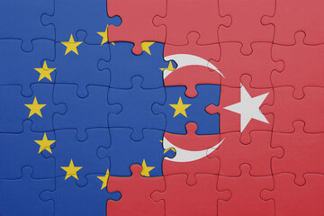 puzzle with the colourful national flag of turkey and flag of european union.