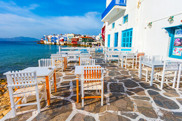 Mykonos, Greece: Waterfront with tables in typical Greek tavern in Little Venice part of Mykonos...