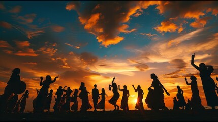 A group of people stand on the beach, silhouetted against the sunset during a cultural celebration - Powered by Adobe