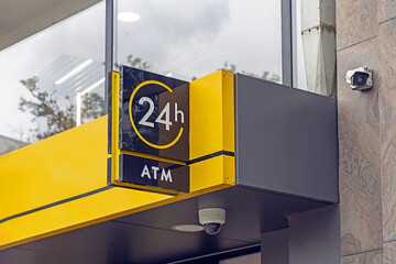 Modern ATM cash withdrawal machine access for 24 h on a street