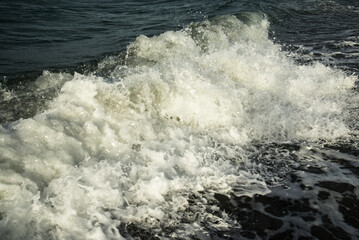 Close up - wave on the sea coast in Crete
