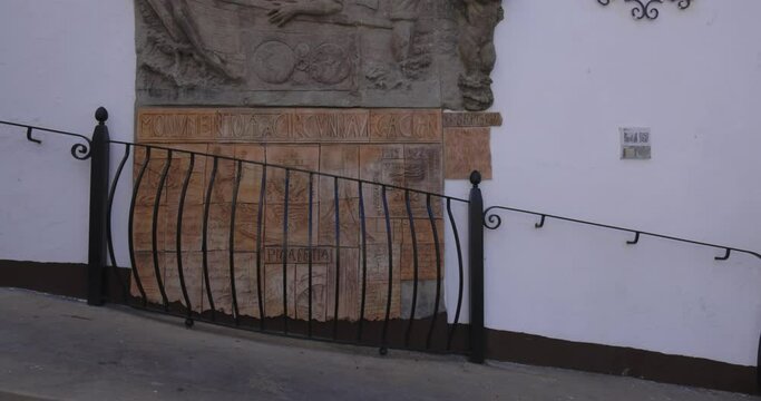  Juan Sebasti&aacute;n Elcano and Magellan expedition survivor monument on building facade in Sanl&uacute;car of Barrameda tilt up.