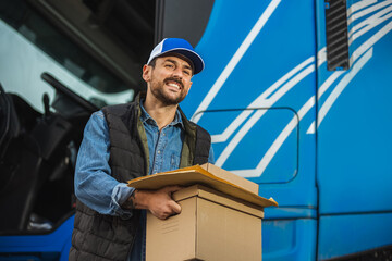 Portrait Of Courier With Delivering Package.