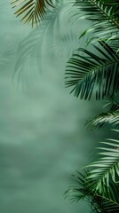 Fototapeta premium Green background with palm leaves. Minimalism, blank space.