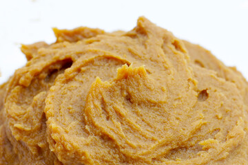 Japanese miso paste on white background.