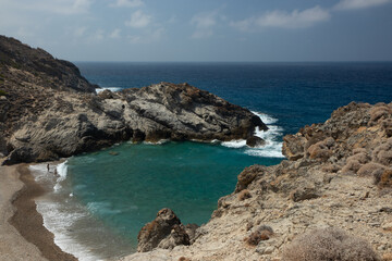 Wild rocky coast with picturesque cove at the famous Nas beach, Ikaria, Greek Islands