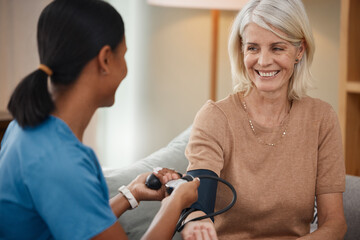 Mature woman, nurse and blood pressure machine in cardiovascular, healthcare or wellness with...
