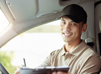 Delivery man, portrait and checklist in van for freight information on schedule, logistics and...