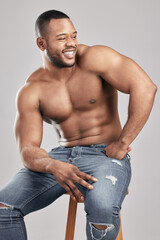 Thinking, body muscle and happy black man in studio for fitness, health or sport exercise isolated...