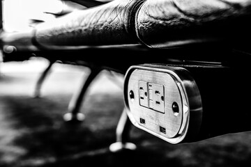 Selective focus on airport terminal phone charging outlet station