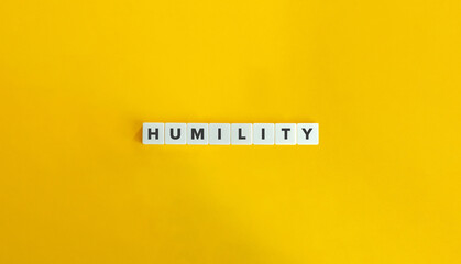 Humility Word. Concept of Having a modest view of one's importance and being open to learning from others. Text on Block Letter Tiles on Flat Background. Minimalist Aesthetics.
