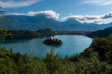 The famous and beautiful lake Bled with it&rsquo;s signature small Bled Island with in the background Bled Castle on the high cliff, Bled, Slovenia