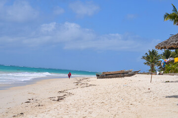 Paradise beach with white sand and palm trees in Kenya