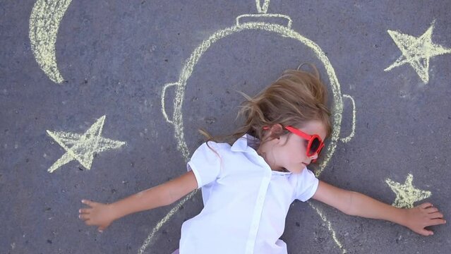 Astronaut Girl Pretending to be in Space with Stars