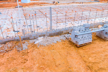 As of now, concrete is ready to be poured on top reinforcement metal framework to form foundation.