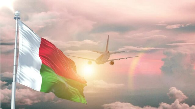 Madagascar flag Waving Realistic With Sky Plane Takes Off At Sunrise