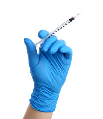 Female doctor with medical syringe on white background