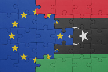 puzzle with the colourful national flag of libya and flag of european union.