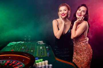 Photo of gorgeous people ladies bachelorette celebrate holiday in casino risk chance win black jack...