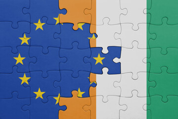 puzzle with the colourful national flag of cote divoire and flag of european union.