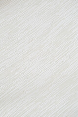 Soft white chenille upholstery fabric texture. Close-up detail photograph.