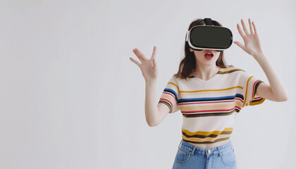 Young woman wearing virtual reality goggles headset, vr box. Connection, technology, new generation and progress concept. Studio shot on gray